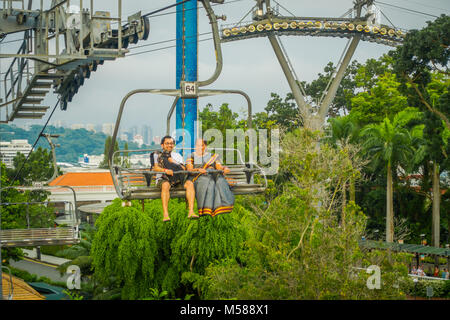 SINGAPORE, SINGAPORE - JANUARY 30, 2018: Outdoor view of unidentified people at Singapore Sentosa Cable Car and Skyline Luge, Singapore Stock Photo