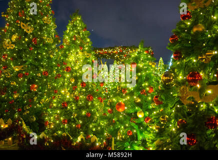 Toys on the Christmas trees at the Manege square in Moscow. Stock Photo