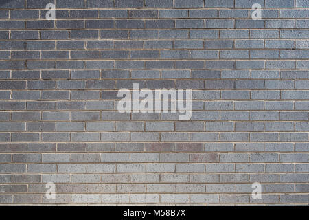 Texture of grey bricks with blue metallic reflects Stock Photo