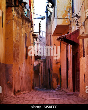 Narrow street in Moroccan city Stock Photo