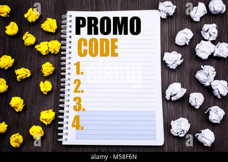 Conceptual hand writing text caption showing Promo Code. Business concept for Promotion for Online Business Written notepad note notebook book wooden  Stock Photo