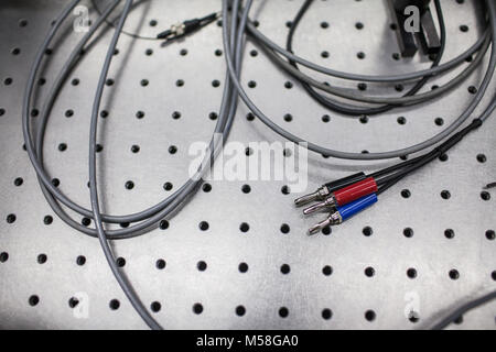 Digital oscilloscope is used by an experienced electronic engineer in the laboratory Stock Photo