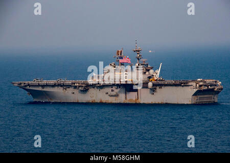 180218-N-XK809-357  GULF OF THAILAND (Feb. 18, 2018) The amphibious assault ship USS Bonhomme Richard (LHD 6) transits the Gulf of Thailand during a Cobra Gold 2018 photo exercise. Bonhomme Richard is participating in CG-18 alongside Royal Thai Navy ships and personnel, conducting a range of amphibious operations that will enhance the tactical expertise of participants and rehearse combined capabilities to respond to contingencies. The annual exercise conducted in the Kingdom of Thailand takes place Feb. 13-23 with seven full participating nations. (U.S. Navy photo by Mass Communication Specia Stock Photo