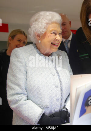 Queen Elizabeth II reacts as she visits London Fashion Week's BFC Show Space in central London. Stock Photo