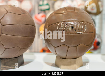 Football in retro design on the counter of the store. Stock Photo