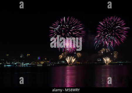 Fireworks high in the sky above the city of Liverpool. Stock Photo