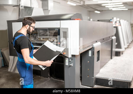 Checking printing quality at the printing plant Stock Photo