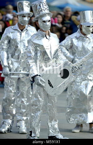 unrecognizable man wrapped with aluminium foil, guitarist Stock Photo