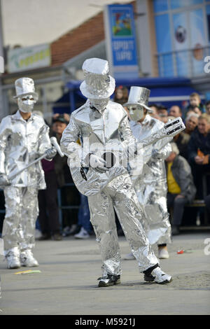 unrecognizable man wrapped with aluminium foil, guitarist Stock Photo