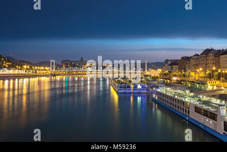 Cruise ships standing at a Danube quay by the break of day, Budapest Stock Photo