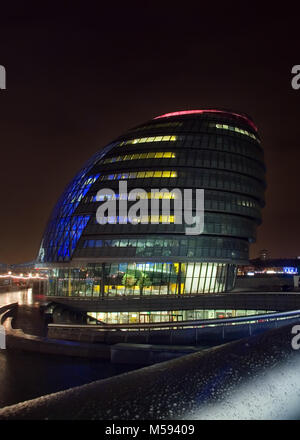 London, United Kingdom - February 10th, 2007: London city hall illuminated in the evening Stock Photo
