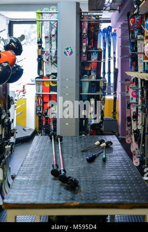 La Thuile, Italy - Feb 18, 2018: Ski and snowboard rental shop workshop with equipment ready for rental Stock Photo