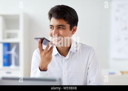 businessman using voice recorder on smartphone Stock Photo