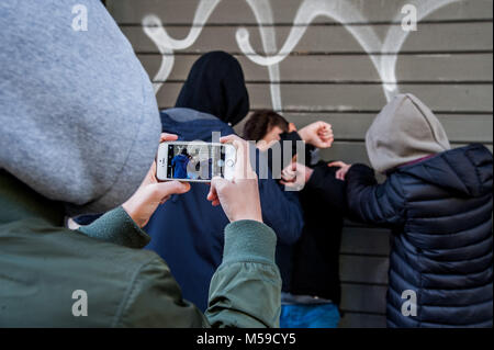 A group of boys bullies a peer in Rome  Featuring: Atmosphere, Bullying, Bullies Where: Rome, Italy When: 20 Jan 2018 Credit: IPA/WENN.com  **Only available for publication in UK, USA, Germany, Austria, Switzerland** Stock Photo