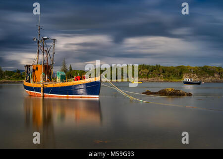 Abandoned fish cutter in Ardvasar harbour, Isle of Skye, Scotland Stock Photo