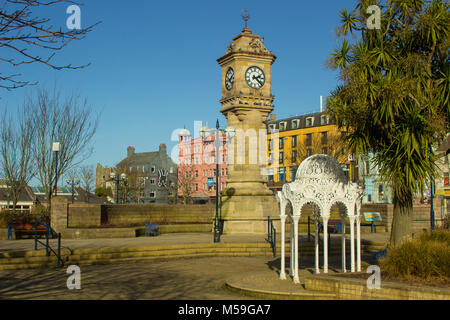 The McKee Clock and tower with the old Victorian Fountain located in the sunken gardens in Bangor Northern Ireland Stock Photo