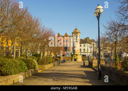 The McKee Clock and tower with the old Victorian Fountain located in the sunken gardens in Bangor Northern Ireland Stock Photo