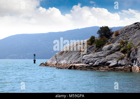 Whyte Islet Park on Whytecliff Island at Whytecliffe Park Beach in West Vancouver, British Columbia, near Horseshoe Bay, with Bowen Island in backgrou Stock Photo