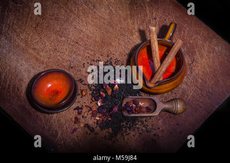 Above vintage view of tea preparing details with cinnamon Stock Photo