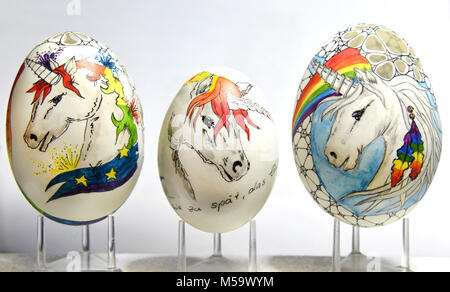 19 February 2018, Saxony, Leipzig: At the hobby Easter egg painter Kerstin Dischereit's small Easter eggs workshop, unicorns, duck eggs and a chicken egg (center) stand in her small Easter eggs workshop. For the various Easter egg markets in Germany, the next ones are in Bavarian Pocking (24/25/02/18), Eutin (Schleswig-Holstein, 3/4/03/2018) and Leipzig (9-11/3/2018), she has painted and milled several thousand eggs in over 30 years, provided with metal applications, designed them as sculptures and in 3-D techniques. | usage worldwide Stock Photo