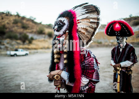 The Pharisees of the Yaqui tribe perform a ritual with masks of strange characters from animals, demons, aliens, extra terrestrials, etc., as part of Lent in Coloso Alto colony in Hermosillo, Sonora, Mexico. Stock Photo