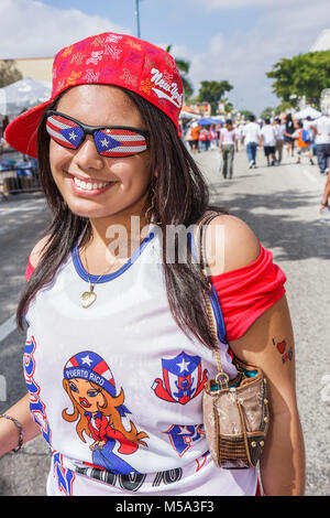 Miami Florida,Little Havana,Calle Ocho,Calle Ocho Festival,festivals fair,Carnaval Miami,Hispanic celebration,street party,girl girls,youngster,female Stock Photo