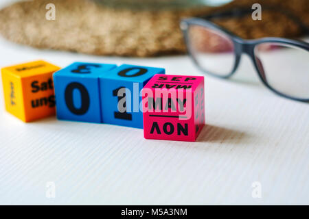 perpetual calendar made with plastic colored cubes. Set on may 1st Stock Photo