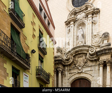 Beautiful stone carvings at the entrance of Església de Santa Maria in La Bisbal d'Emporda, Baix Emporda, Catalonia, Spain Stock Photo