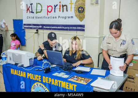 Miami Florida,Hialeah,Milander Park,Easter Egg stravaganza,fair,community Kid Print,child identification program,ID,Hispanic public safety,tracking,of Stock Photo