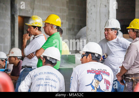 Miami Beach Florida,Ocean Drive,Hispanic Latin Latino ethnic immigrant immigrants minority,man men male adult adults,men,under new construction site b Stock Photo