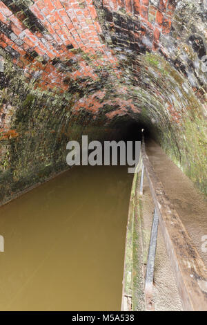 Inside the Chirk canal tunnel locally known as the 'Darkie' built in 1801 and designed by William Jessop and Thomas Telford Stock Photo