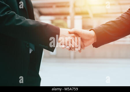 business man hand shaking closing a deal ,business team partnership concept Stock Photo