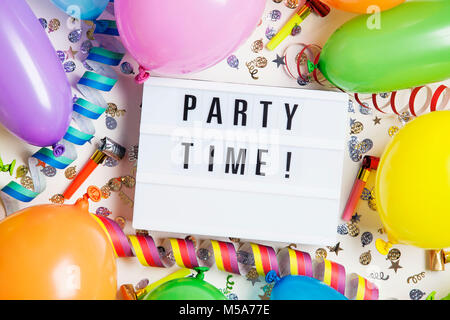 Party celebration background with time to party message on a lightbox ...