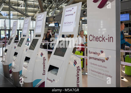 Self-Check-in machines in Linate Airport, Milan, Italy Stock Photo