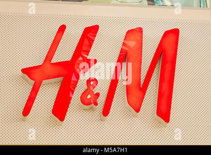 H&M store sign logo, UK Stock Photo