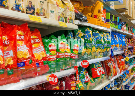 Crisps / potato chips on supermarket shelves, uk Stock Photo