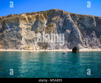 Beautiful face of the Ponza Island seen from the crystal clear blue water of Chiaia di Luna Stock Photo