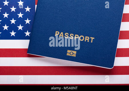 High Angle View Of Passport On American Flag Stock Photo