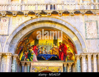 Death Saint Mark Evangelist Mosaic Exterior Facade Saint Mark's Basilica Venice Italy.  Church created 1063 AD to House Saint Mark's body Stock Photo