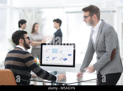 two businessmen analyzing stats financial data Stock Photo