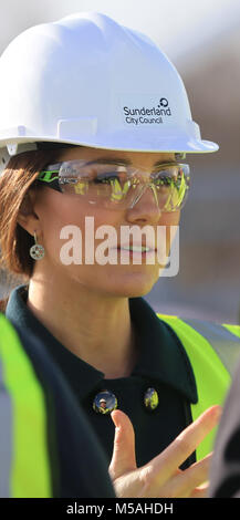 The Duchess of Cambridge talks to construction workers during a visit to the Northern Spire bridge across the River Wear in Sunderland. Stock Photo