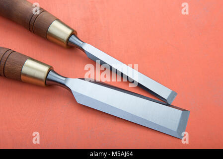 A professional chisel on a wooden background, with room for text Stock Photo