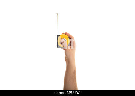 Hand holding a yellow measuring tape on white background Stock Photo