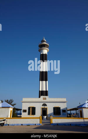 Cap d'Artrutx Lighthouse, located in the extreme south-western point of the island adjacent to the larger resort of Cala en Bosch, Menorca,Balearic Is Stock Photo