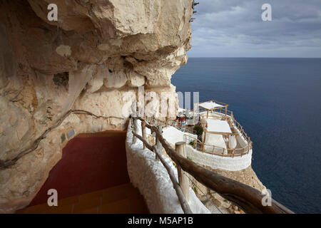 Cova d'en Xoroi bar, situated on a cliff on the south coast of Minorca, Spain Stock Photo