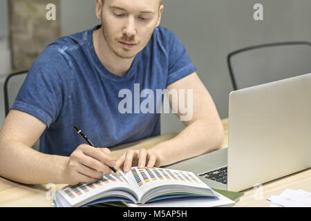Man working in office Stock Photo