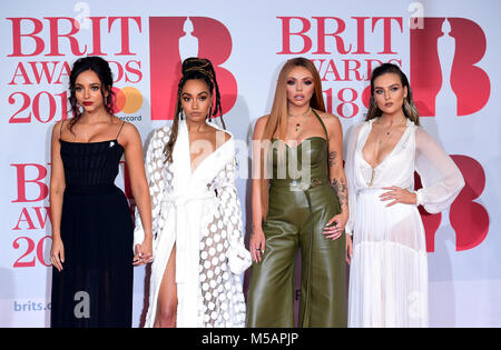 Little Mix's Perrie Edwards, Jesy Nelson, Leigh-Anne Pinnock and Jade Thirlwall attending the Brit Awards at the O2 Arena, London. Stock Photo