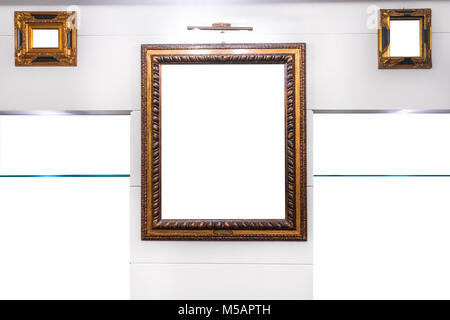 Antique wooden frames mock on wall white, with shelves Stock Photo