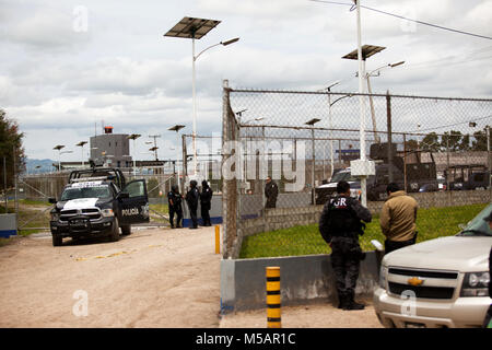 Federal Police and other authorities exit the Altiplano maximum-security prison near Toluca, Mexico on Sunday, July 12, 2015. The notorious cartel leader Joaquin 'El Chapo' Guzman escaped from this high security prison the night before, the second time he has escaped a Mexican prison. Stock Photo