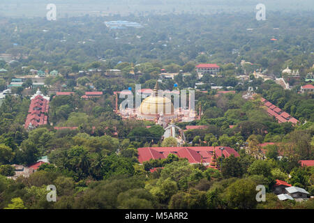 Sitagu International Buddhist Academy in Sagaing near Mandalay in Myanmar (Burma), viewed from above on a sunny day. Stock Photo